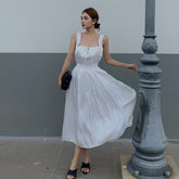 Silk midi dress with ruched bust and wide straps in fluid A-line silhouette for women